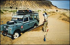 Left behind: an abandoned vehicle on the Grave Route in Algeria, April 2003