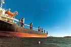 Activist Chris Swain swims the polluted Columbia River.