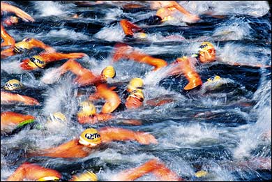 Wet work: Racers swimming Lake Almaden during the San Jose International Triathlon