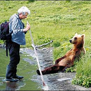 Bear Whisperer: Russel with Biscuit, an orphaned bear he raised in Kamchatka