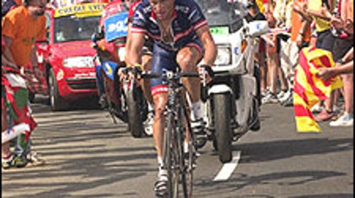 Armstrong narrowly bested Ivan Basso for a Stage 13 victory