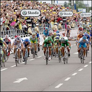 The peloton races to the finish line in Friday's Stage 7. Robbie McEwen snagged the win for his second in three days.