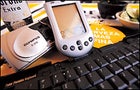 Olympus's D-370 digital camera, and the Palm105 with the Palm Portable Keyboard
