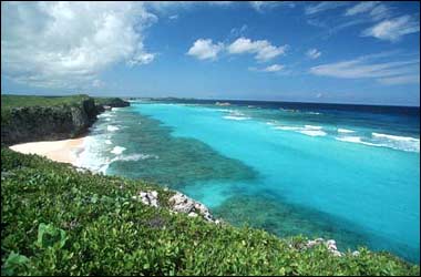 Let the white-sand beach match your dress: A beach on Turks and Caicos