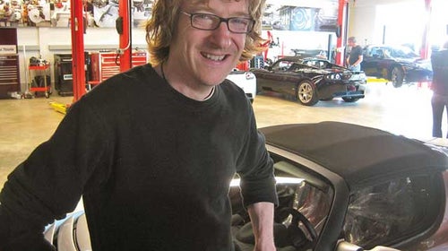 Paine at the Tesla dealership in Los Angeles