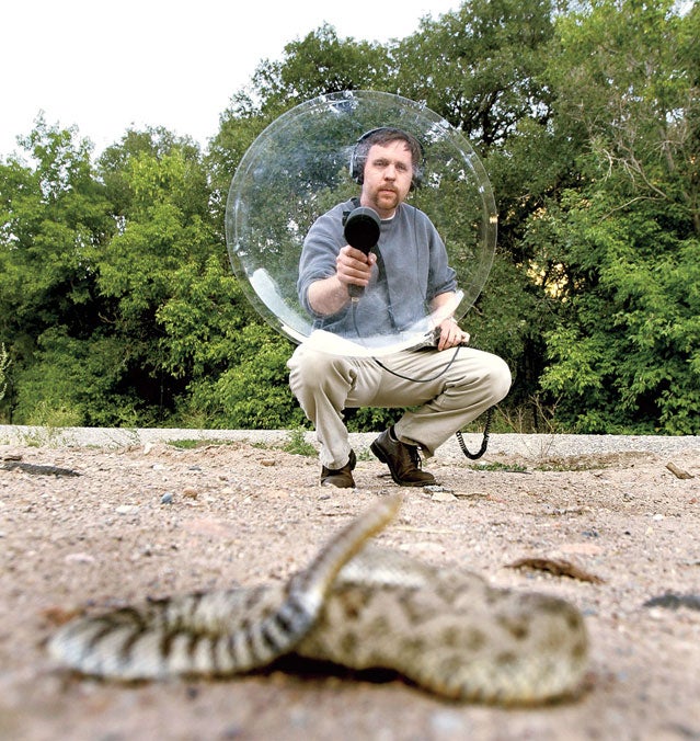 Jeff Rice records the chilling rasp of a rattlesnake for the Western Soundscape Archive