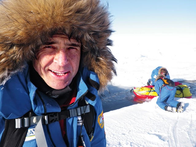 Farmer, in his Arctic garb, has averaged two marathons a day and raised more than $100,000 for the Red Cross