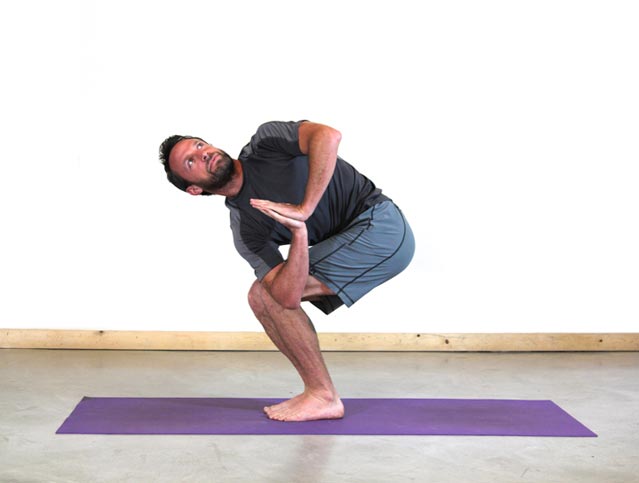 https://cdn.outsideonline.com/wp-content/uploads/migrated-images_parent/migrated-images_45/revolved-utkatasana-yoga-pose.jpg
