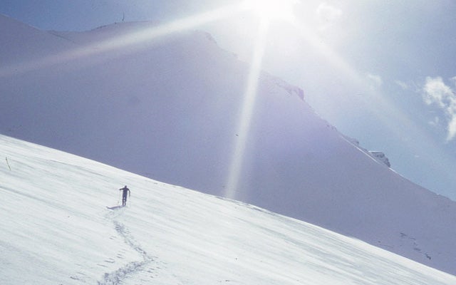 Bill Holland skiing across the top of Snow Dome.