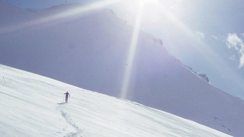Bill Holland skiing across the top of Snow Dome.