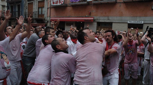 Men waiting to catch fountain-jumpers.
