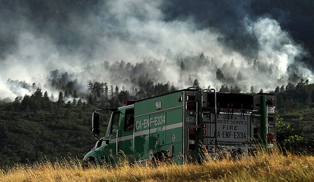 forest fire Colorado firefighters. global warming climate change