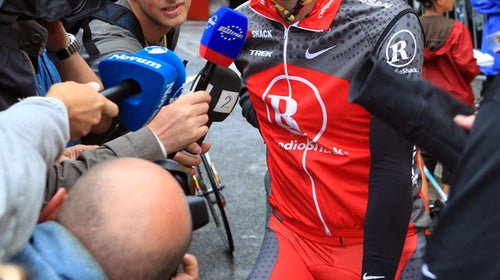 Lance Armstrong gives an interview at the 2010 Tour de France.