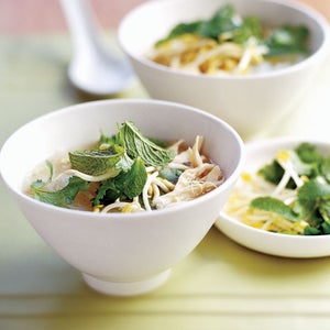 Asian chicken soup with soya sprouts and Thai basil