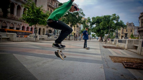 Ruben Ladron kickflips his way down the Prado.