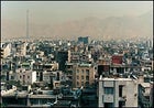 The Elburz Mountains rise over Tehran.