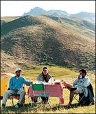 Kicking back in the Elburz: left to right, Shahram, the author, and Abbas Jafari meadow-camping at 9,000 feet.