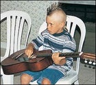 Sporting a mohawk at seven
