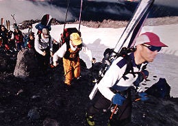 What goes up...: Heil leading his crew through the cinder on Monitor Ridge, Mount St. Helens