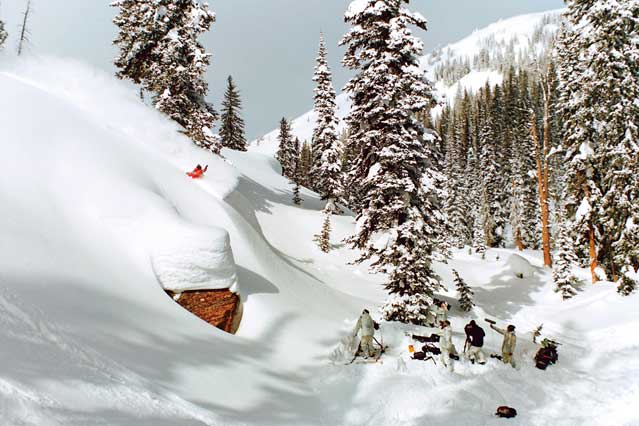 Flying skier on mountains. Extreme winter sport. 3D rendering