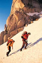 Sunshine seekers: the author and Frost hike to Snowpatch Spire.