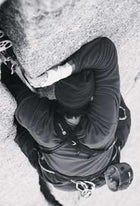 On crack: The author jams up the Sunshine route on Snowpatch Spire.