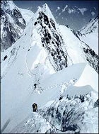 Don't look back; Rick Ridgeway, Foreground, and John Roskelley, members of the first American expedition to summit K2, ascend the northeast ridge in 1978.