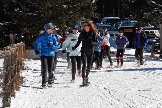 The author (left) runs with Laurie Lambert at a clinic.