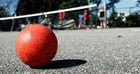 A well-used street hockey ball.