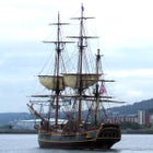 HMS Bounty leaving Greenock on the River Clyde.