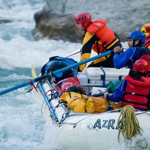 Last Descents guide Travis Winn navigates turbulent waters.