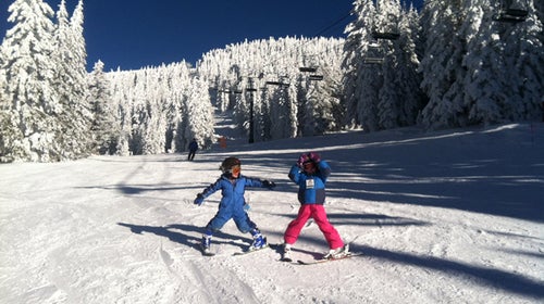 Rohan and Pippa demonstrate pizza proficiency.