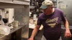 The chef checks on his dessert.