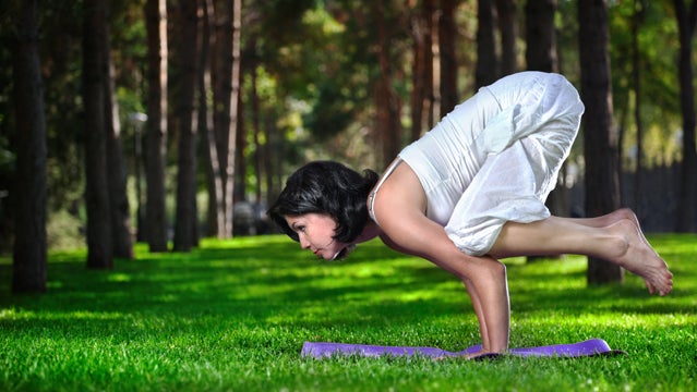 Young sporty woman practicing, doing bicycle crunches pose Stock Photo -  Alamy