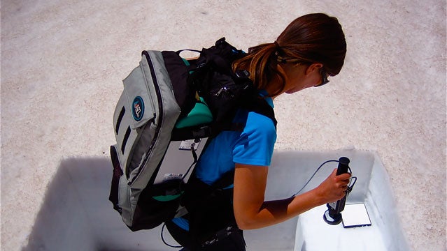 McKenzie Skiles wields her portable spectrometer.