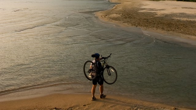 travel triathlon bike river mountains training