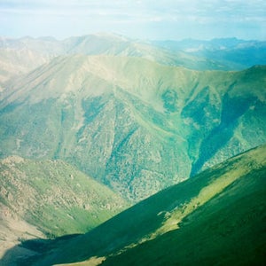 Katie Arnold has breakfast on Mt. Belford