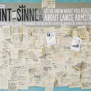 Pages torn from Armstrong's autobiographies, now bearing the scribbled opinions of detractors and some supporters.