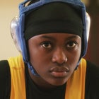 In "First Match," a determined wrestler prepares for her first coed high school match.