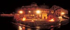 Kathmandu-based photojournalist Thomas Laird's exclusive photograph of the royal funeral pyres blasing on the Aryaghat (steps) of the Pushapati Temple, above the Bagmati River, in central Kathmandu. The shot was taken at 1:00 on the morning of June 3, 28 hours after the massacre. The three pyres are those of Prince Nirajan (far left), younger brother of Crown Prince Dipendra; Queen Aiswarya (center); and King Birendra (far right).