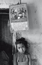 Rolpa girl with communist all-stars calender.