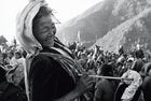 Happiness for this village woman at the Rolpa rally is a well-packed cannabis pipe and a day of Maoist sloganeering.