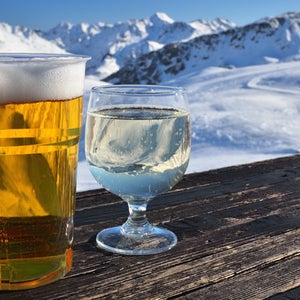 two glasses with beer and white wine