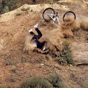 achievement action active adventure agility athlete athletic athleticism balance bicycle bicycling biking cameron zink color color image confidence control crash day day time daytime desert determination fall green river helmet male man mountain biking nature north america nwd 6 outdoors outside strength united states usa utah vertical wreck