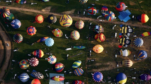 Mass ascension launch during the Great Reno Balloon Race at the Rancho San Rafael Park in Nevada.
