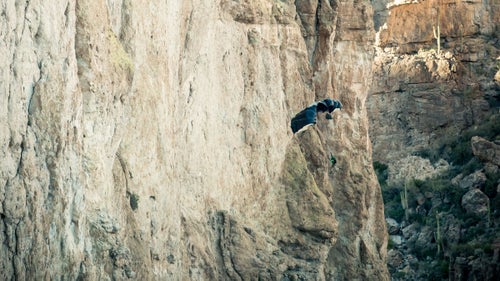 One of the most dangerous parts of jumping solid objects, such as cliffs, is the possibility that one鈥檚 parachute can open backward, causing the jumper to fly at the cliff. A 180, as it's called, can cause the parachute to snag and/or result in serious injury leaving the jumper dangling and helpless. In this photo James Yaru opened with a 180 but narrowly avoided the cliff as he managed to turn around with a couple feet to spare.