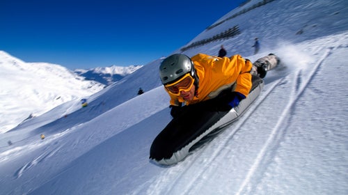 You should definitely wear a helmet. And bring a shovel, an avalanche beacon, and a pair of snowshoes. Use a high-performance sled, one that鈥檚 light enough to haul to the summit and robust enough to handle steeps and drops. You鈥檒l want a method of self-arrest in the event you part with your ride. Mt. Massive and Mt. Elbert are good options because of their low grades. Throw in an extra granola bar. This could be a workout.