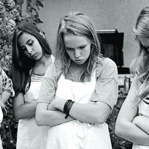 From right: Tarpley and Yancey  with friends preparing to roast