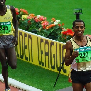 OutsideOnline Kenenisa Bekele smile track finish