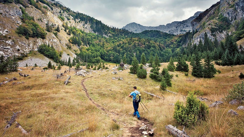 A hiker on the Via Dinarica Trail in the Balkans.